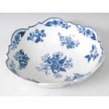 A Worcester porcelain blue and white bowl, decorated in the Pinecone pattern and having scallop