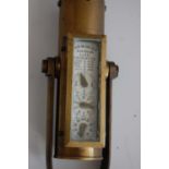 A late 19th century brass cased Taffrail log, the cylindrical body with rectangular three dial gauge