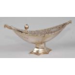 A silver gilt pedestal pot pourri, of boat shape, having scroll cut engraved and pierced half-hinged