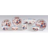 Lowestoft porcelain teawares, comprising three bowls on stands, one slop bowl, and one cream jug,
