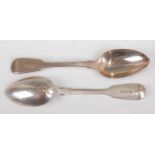 A set of twelve George IV silver dessert spoons, in the Fiddle pattern, each with monogrammed
