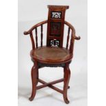 A circa 1900 Chinese stained hardwood yoke chair, the panelled back with carved relief and pierced