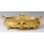 A 19th century gilt bronze jardiniere, of bellied oval form, having end carry handles, opposing
