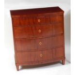 A 19th century continental mahogany bowfront chest, of four long drawers, each having satinwood