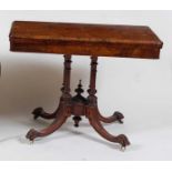 A Victorian figured walnut pedestal card table, the fold-over top having swivel action and opening