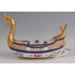 A Samson of Paris porcelain inkwell, modelled as a small galleon, decorated in the Imari palette,