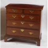 A George III mahogany squarefront chest, the top having a moulded edge, over two short and three