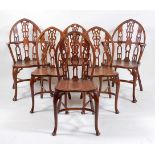 A set of six elm seat and fruitwood Windsor chairs, in the Gothic taste, each with crinoline