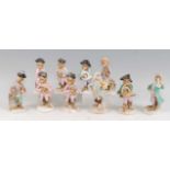 An assembled Dresden porcelain ten-piece monkey band, 20th century, to include four bagpipers, a