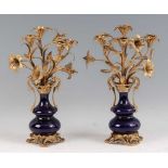 A pair of late 19th century French Rococo Revival gilt bronze and blue glazed porcelain