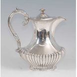 A late Victorian silver coffee pot, of half-reeded squat baluster form with waisted neck, 18.6oz,
