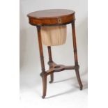 A late 19th century continental figured walnut work table, having a hinged top, all raised on