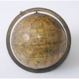 After Hermann Moll – a George III pocket terrestrial globe, comprising 12 hand-coloured gores,