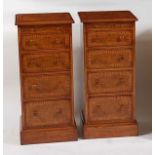 A pair of oak and burr oak four-drawer bedside chests, each having crossbanded top with a brushing