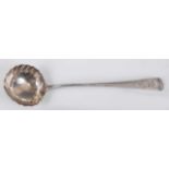 A mid-18th century silver soup ladle, in the Old English pattern, having armorial engraved