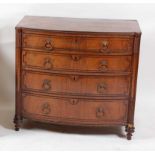 *A Regency mahogany bowfront chest, of four long graduated drawers, each with brass ring handles