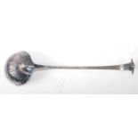 An early George III silver soup ladle, having a shell fluted bowl, 4.7oz, maker probably Thomas
