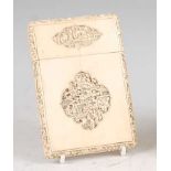 A circa 1900 Chinese Canton ivory calling card case and cover, having shaped and relief carved