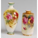 A Royal Worcester porcelain bottle vase, shape No.312, decorated with roses on a shaded ground, puce