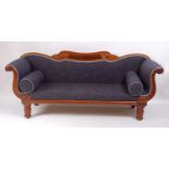 A William IV mahogany double scroll end settee, having a swept back, the whole re-upholstered in a