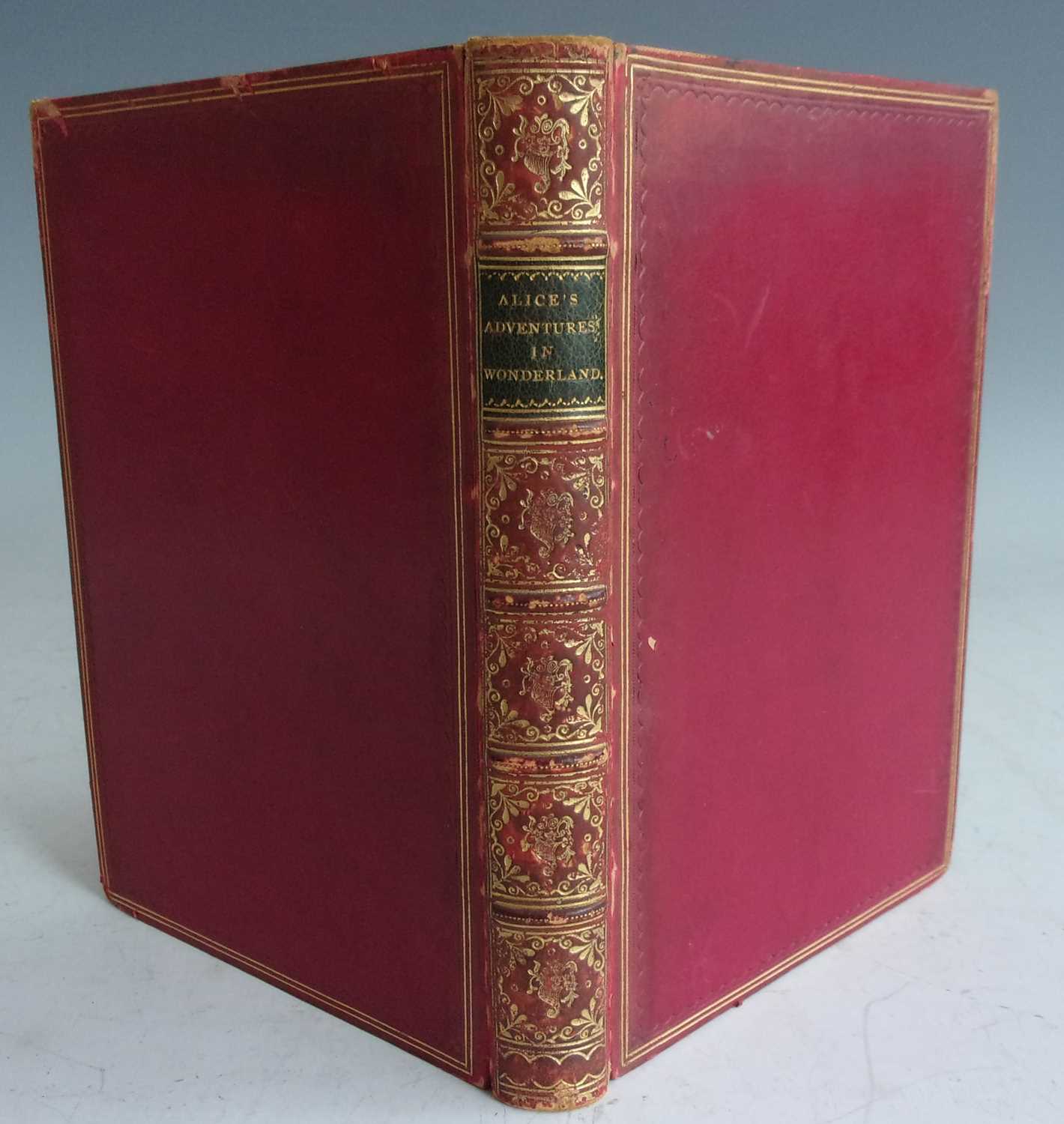 *CARROLL, Lewis. Alice’s Adventures in Wonderland. Macmillan & Co, London 1870. 21st thousand.