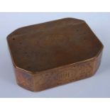 An 18th century brass snuff-box, of rectangular form, with canted corners, all-over stipple engraved