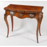 A late 19th century French kingwood and gilt bronze mounted card table, in the Louis XV taste, the