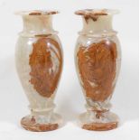 A pair of onyx pedestal urns, of slender baluster form, 20th century, h.61cmCondition report: Both