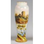A Royal Worcester porcelain vase, shape No.2777, decorated with a view of Pembroke Castle by H.