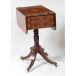 A Regency mahogany and conch-shell marquetry inlaid pedestal work table, the dropflaps having a