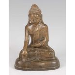 A 19th century Indian bronze Buddha in Bhumisparsha Mudra pose, h.18.5cm