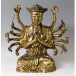 A 19th century gilt bronze Avalokiteśvara Buddhist deity, having eight pairs of arms bearing