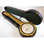 A 20th century four string banjolele, bearing a label for Keith Prowse & Co Ltd, cased, together