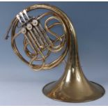 An Anborg Como brass French Horn.