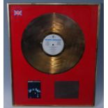 Del Amitri, a presentation gold disc for the album Waking Hours, with photograph of the band and