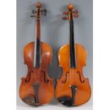 A 20th century Continental violin, having a two piece back, ebony finger board and ebonised pegs,