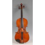 A late 19th/early 20th century violin, having a one piece maple back with ebony fingerboard and
