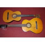 A Resonata German acoustic guitar, together with an Encore ENC36N acoustic guitar. (2)