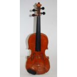 A 20th century 1/2 size violin, having a two piece back and ebony finger board, 30cm, in a leather