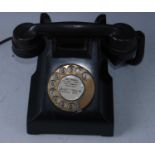 A bakelite telephone, the centre of the dial printed DMC Music Awards 9th Nov. 1992 Best Female