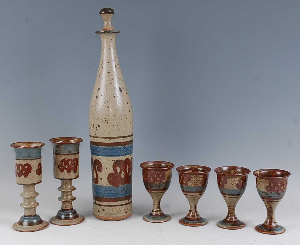 A New Zealand studio pottery salt-glazed wine set, comprising long-necked decanter and stopper, h.