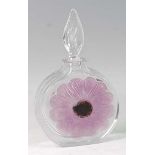 A contemporary Daum Nancy heavy clear glass perfume bottle and stopper, of circular slab-sided form,