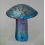 A possibly Loetz iridescent glass paperweight, in the form of a toadstool, unsigned, h.8.2cm