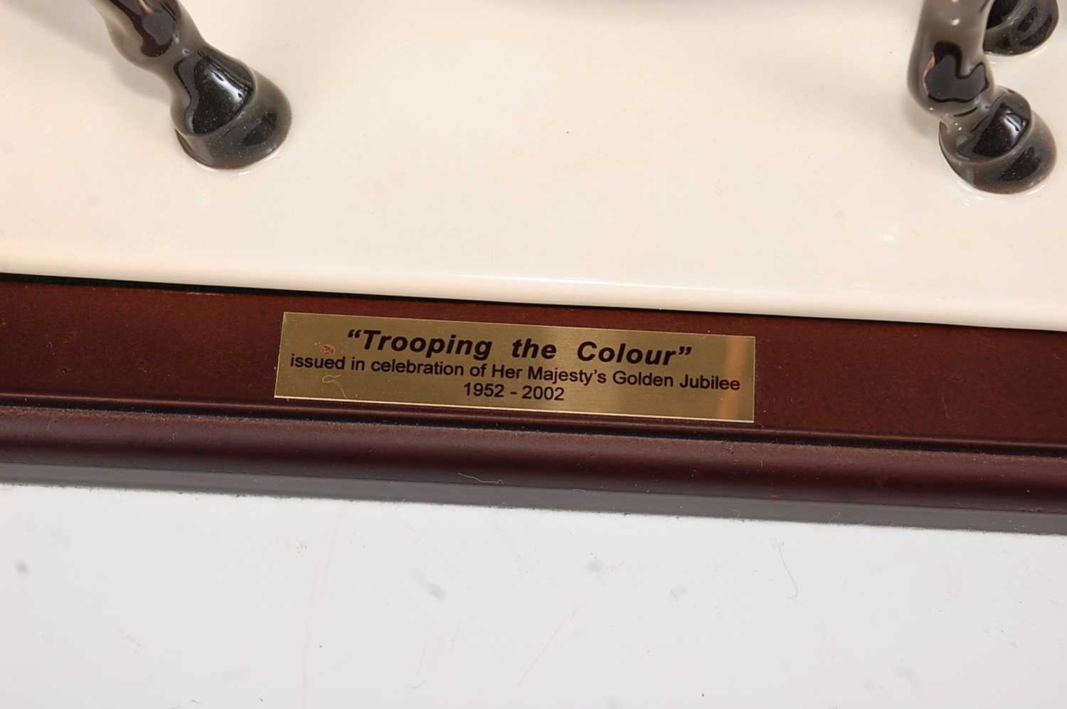A Coalport limited edition figurine 'Trooping the Colour', underglaze painted and heightened in - Image 2 of 9