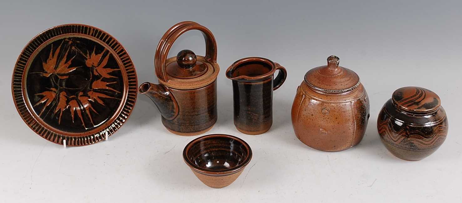 John Jeffs - a studio pottery salt-glazed jar and cover, of onion shape, impressed monogram verso,