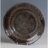 A large studio pottery shallow circular table bowl, floral incised decorated in the Chinese taste,