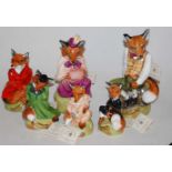 A set of six Royale Stratford figures, each in the form of a fox in various poses, with card labels,