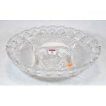 A 19th century cut lead glass oval bowl, with hobnail cut decoration, standing on a circular foot,