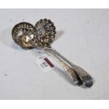A Victorian silver sifting spoon, having pierced and gilt-washed bowl, bright cut engraved handle in