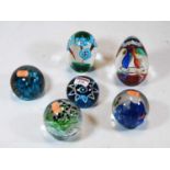 Six various modern glass paperweights